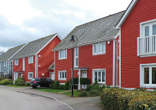 Cape-Cod-rote-graue-Fassade-Bevelprofil-Sonderfarbton